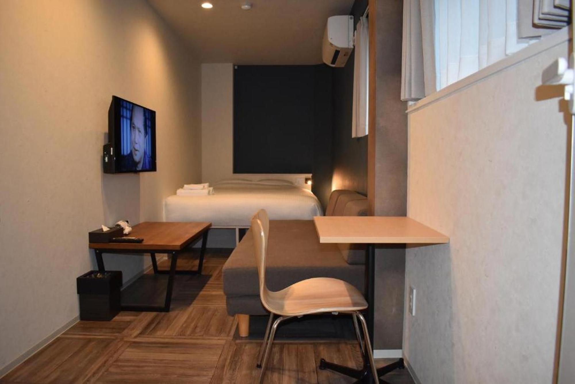 Shinsaibashi House Wisma tamu
